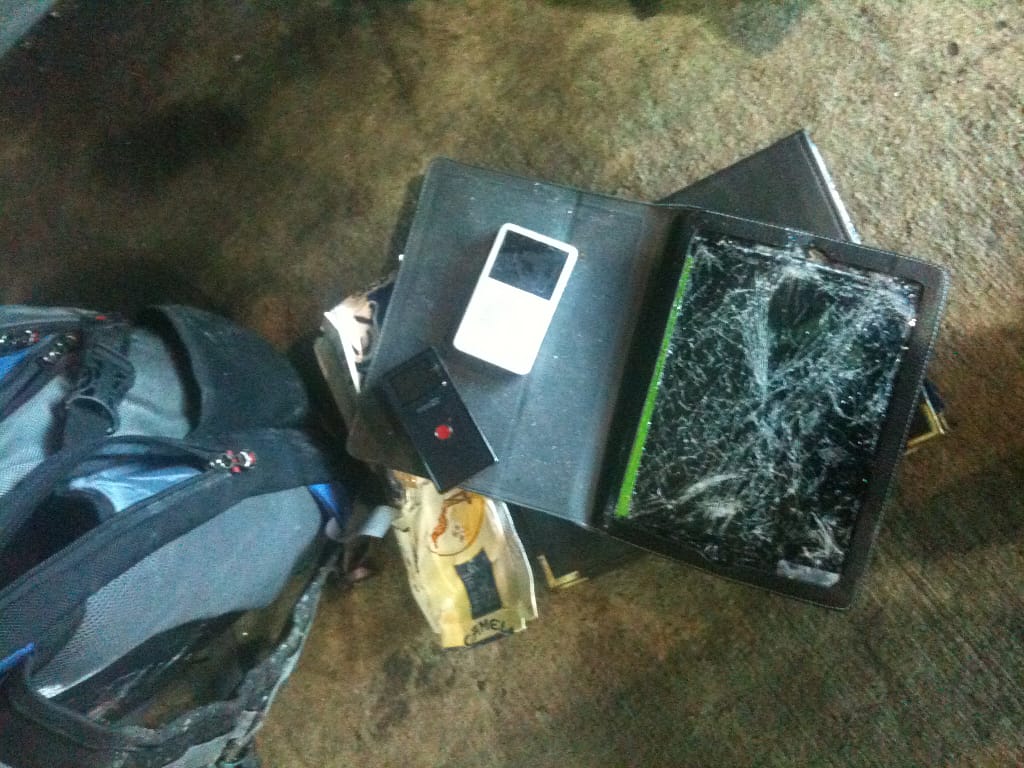 Justin's things are destroyed. Smashed tablet, phone and other other electronics.